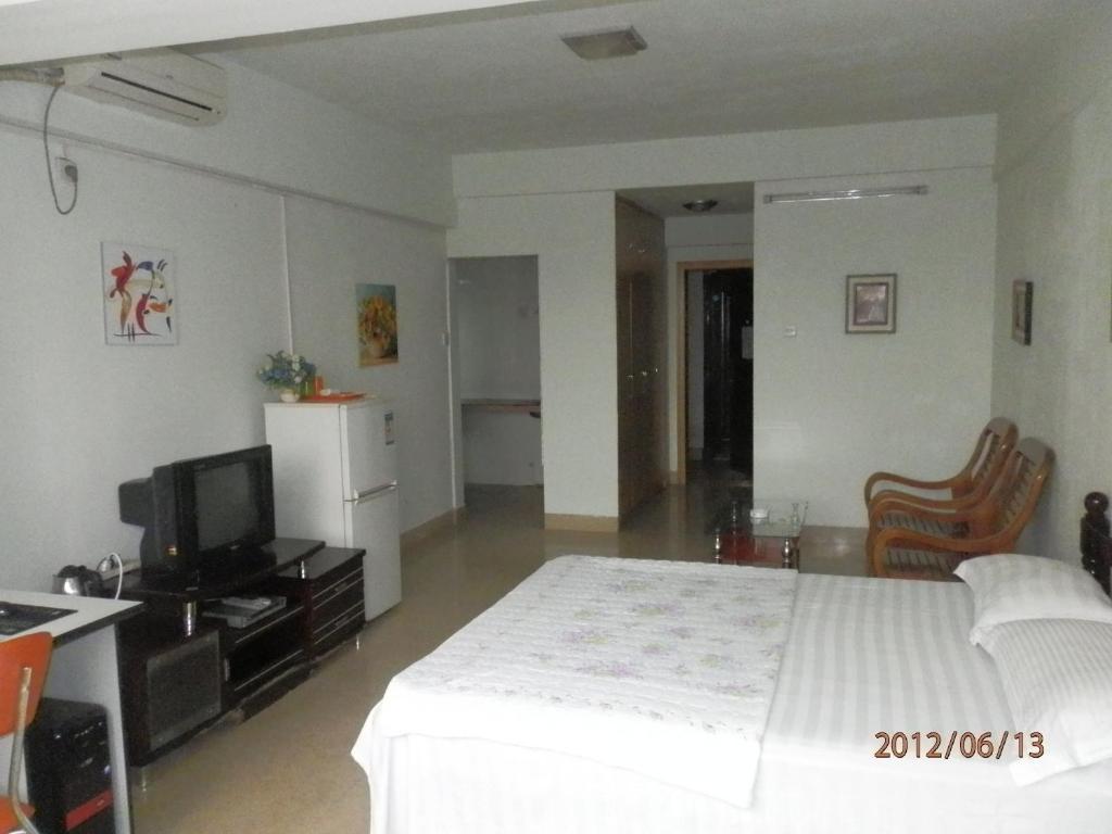 Xingfu Hotel Nanning Rom bilde